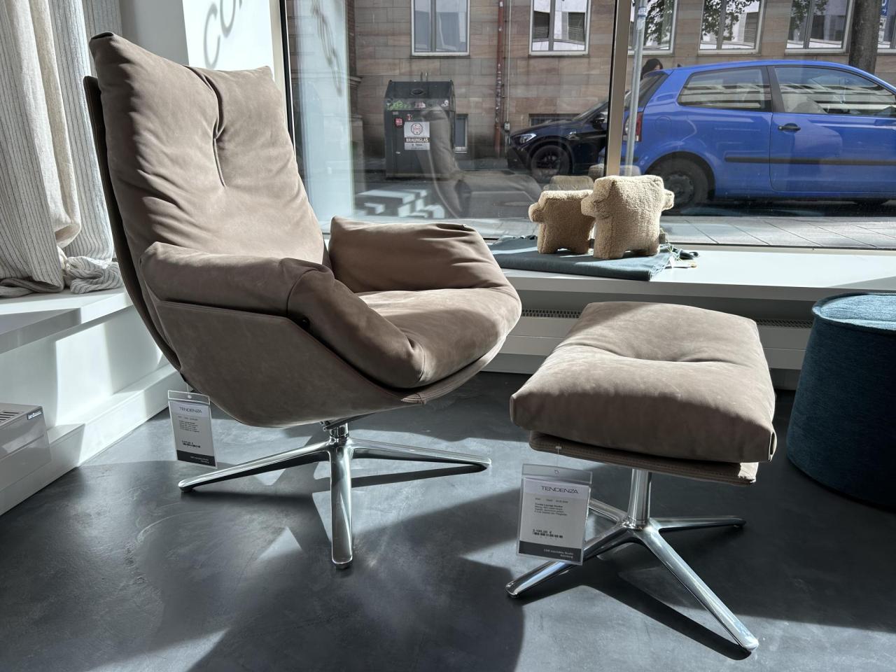 Cor Cordia Lounge Drehsessel mit Hocker, Leder Taupe
